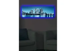 Lerretsbilde med LED-belysning 30x90 cm - Bysilhuett med moderne skyskrapere ved vannkanten